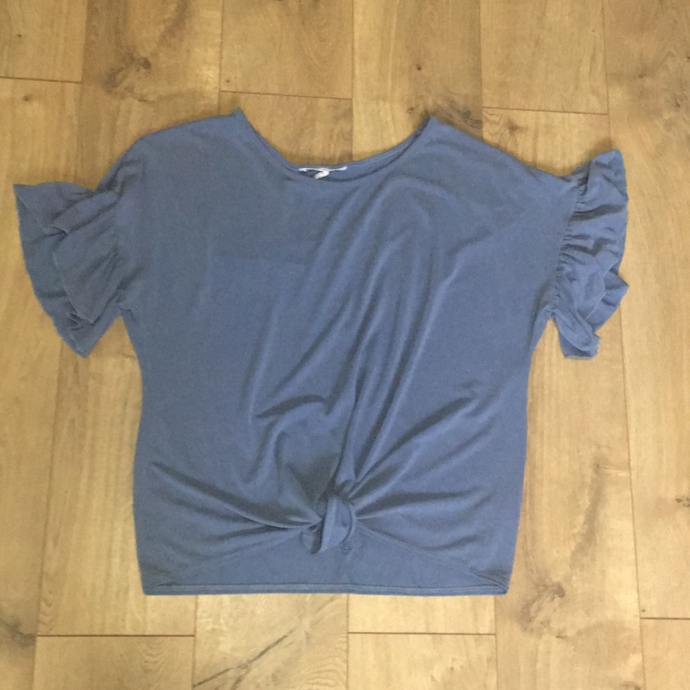 Blue blouse with ruffles on the sleeve